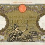 Moneta da 1000 lire d'argento su sfondo neutro, simbolo di valore numismatico attuale.