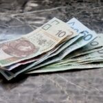 Immagine che illustra l'ereditarietà e i debiti post mortem in relazione ai diritti dei figli.