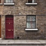 Casa in affitto con cartello 'Canone Concordato' per Over 70, simbolo di esenzione IMU.